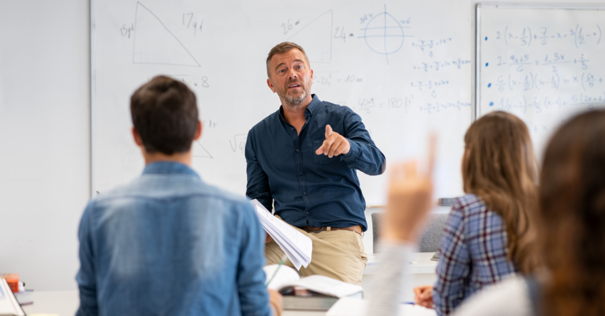 students in a classroom with a teacher