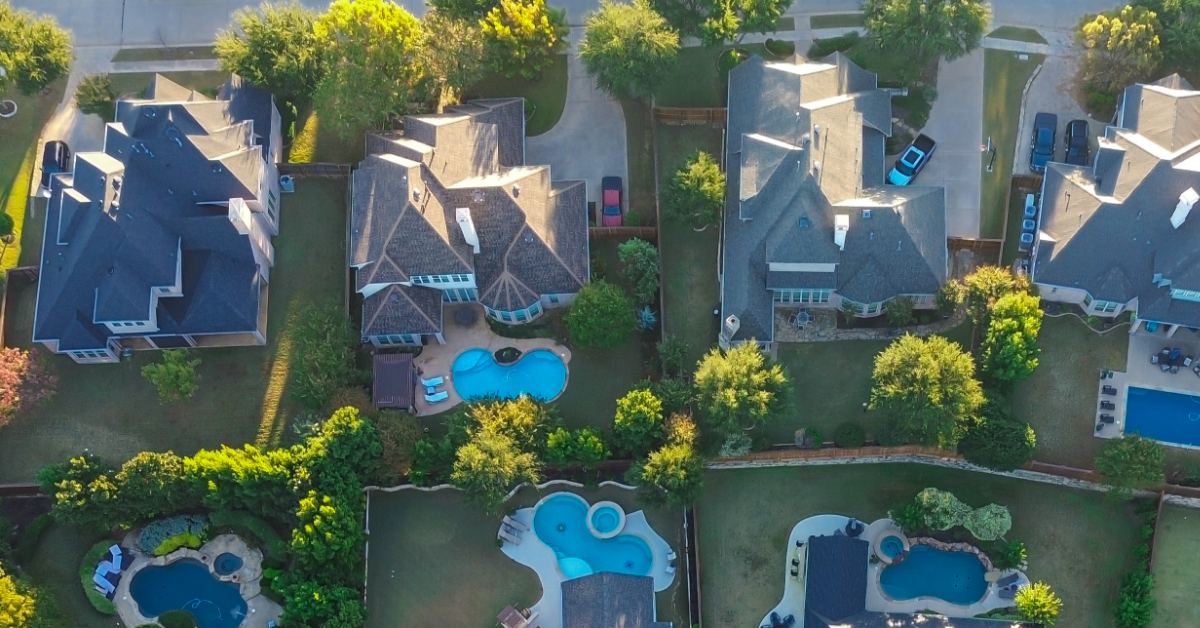 aerial view of homes with pools