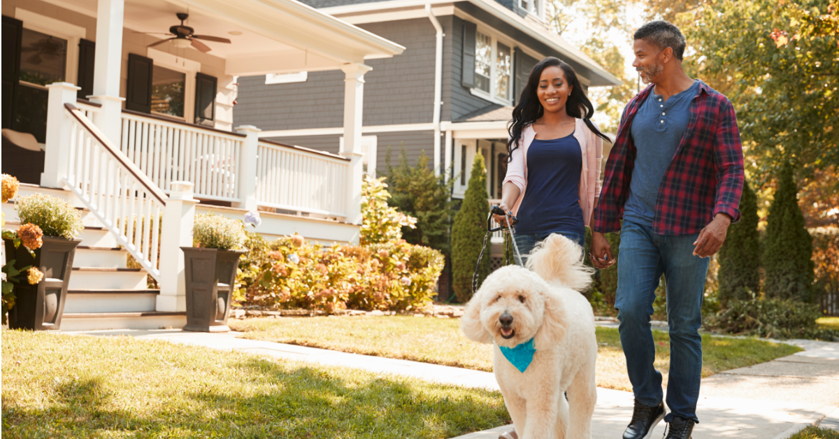 family walking around their neighborhood 